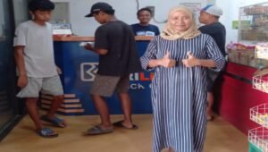 AgenBRILink Opick Sell, Reni Anggraini siap melayani layanan digital.